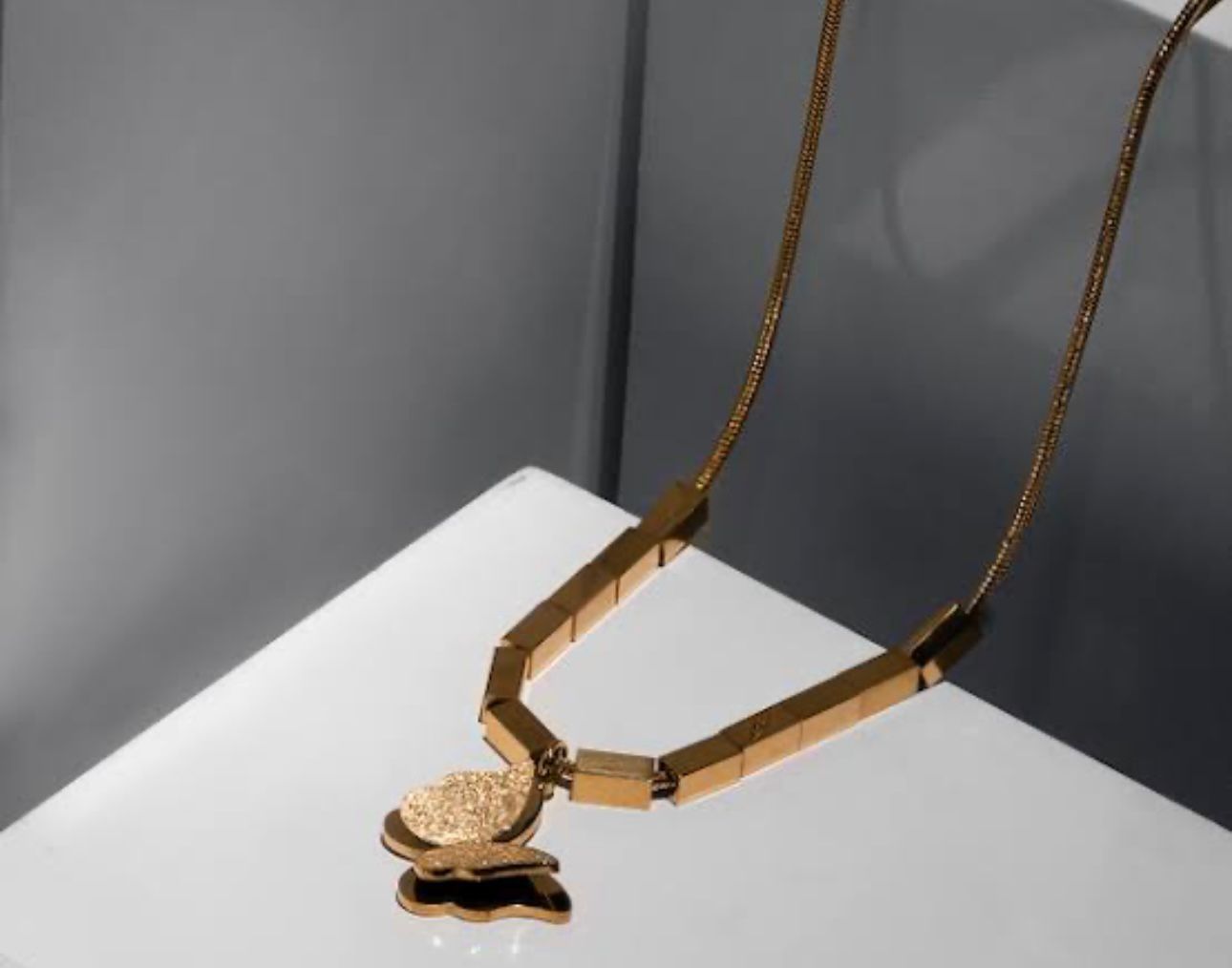 Golden Butterfly Pendant Necklace – Radiant Charm & Grace